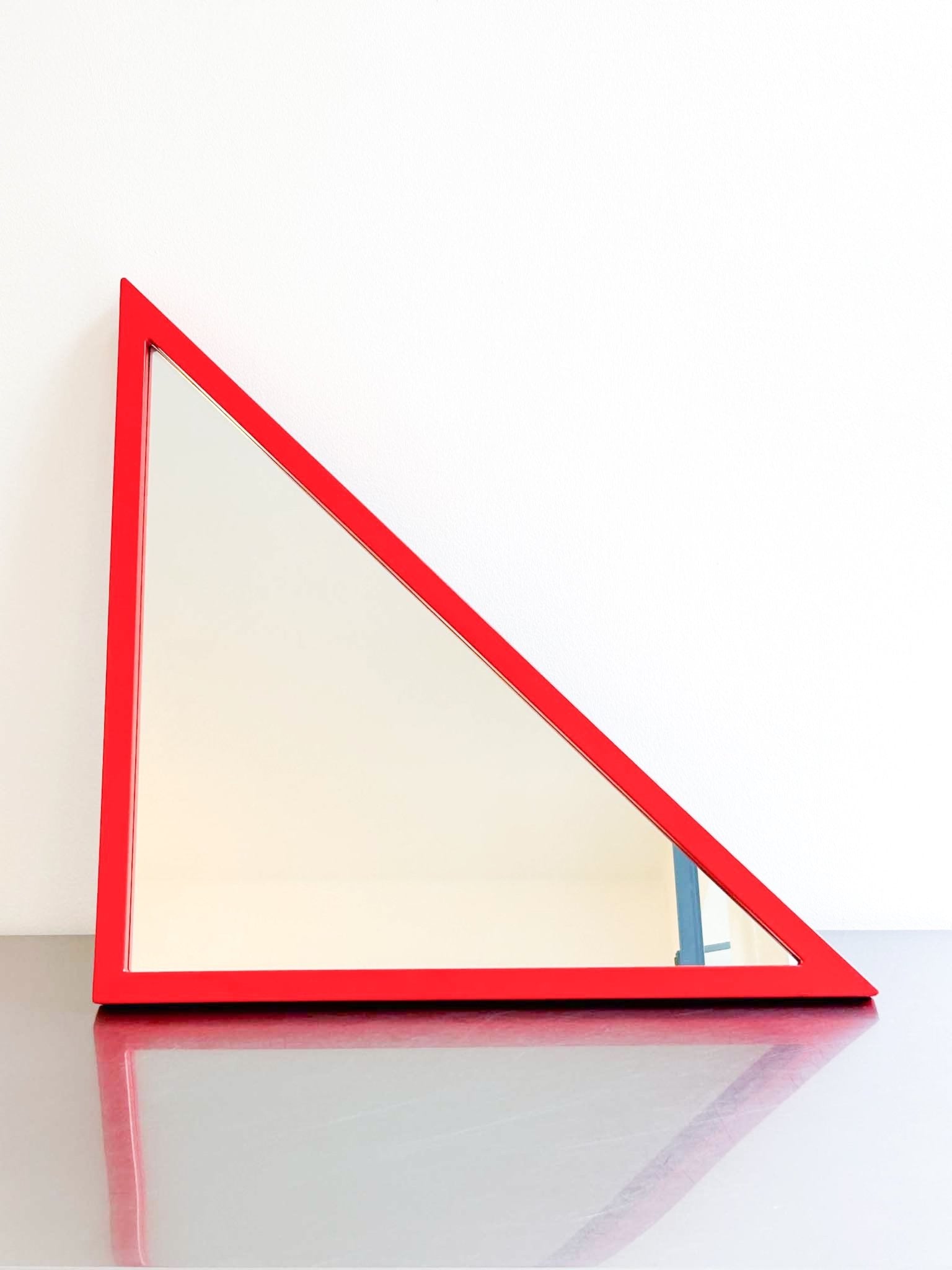 red triangle mirror by Anna Castelli by artetica - Design from Milan