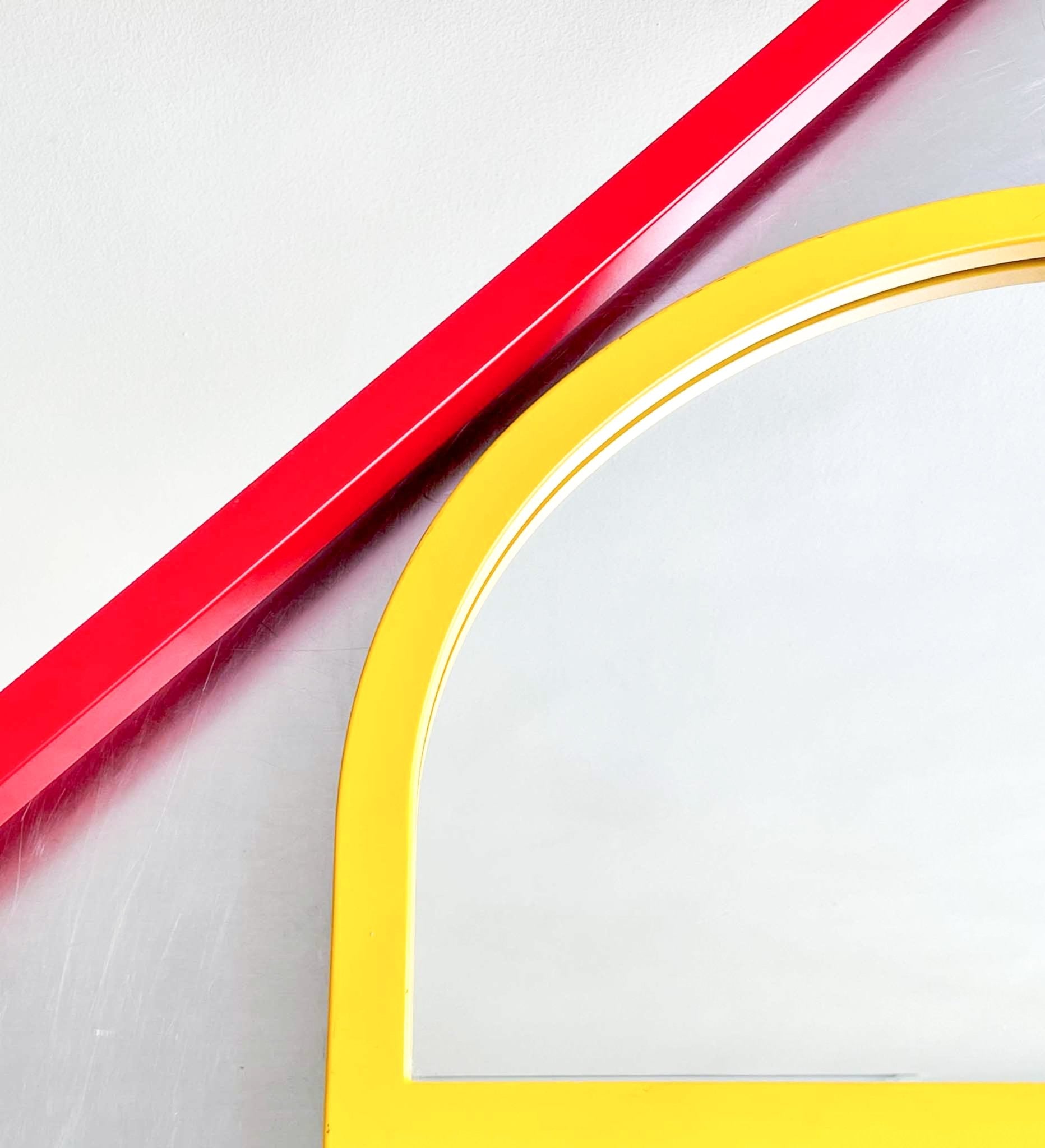red triangle mirror by Anna Castelli by artetica - Design from Milan
