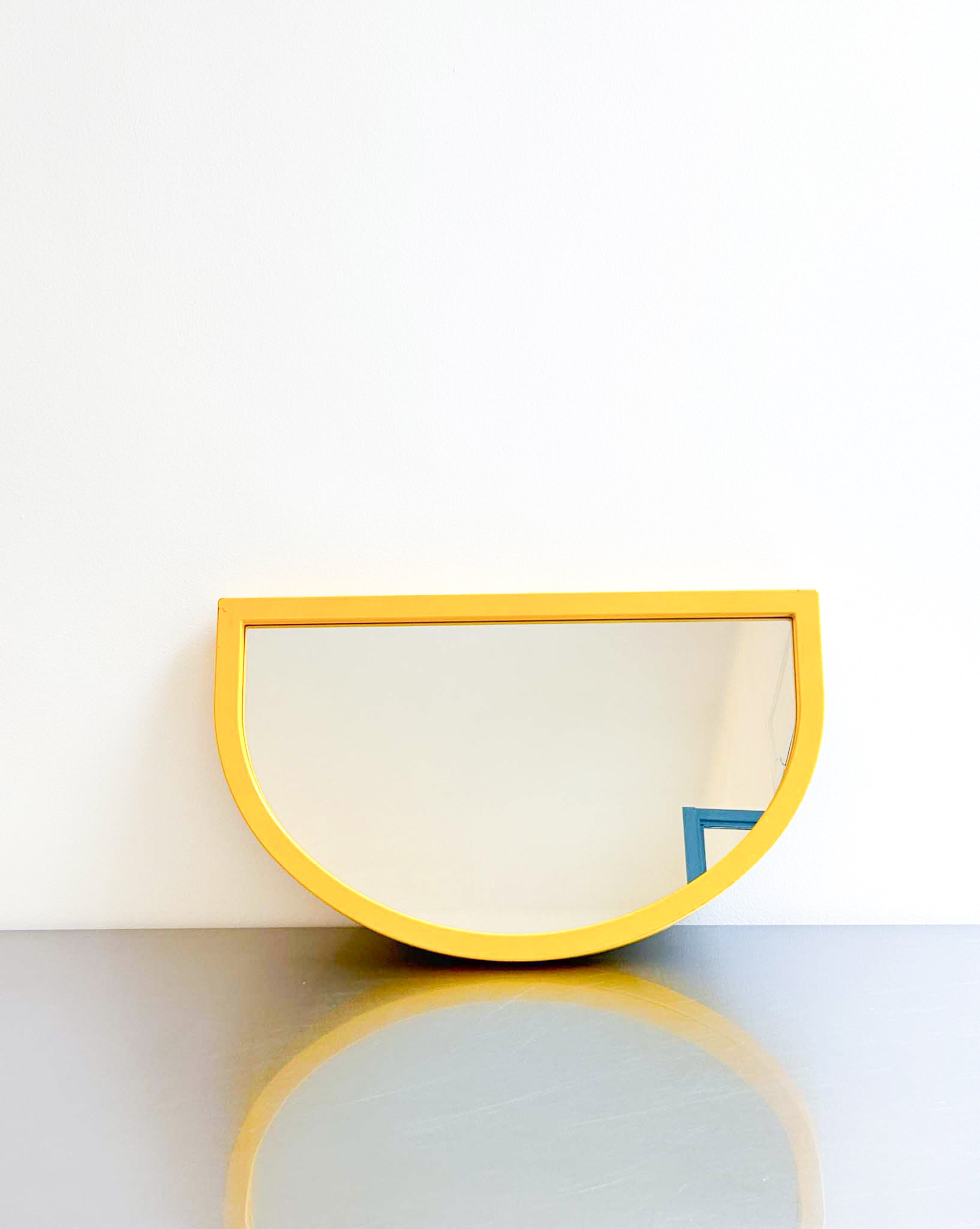 yellow mirror by Anna Castelli