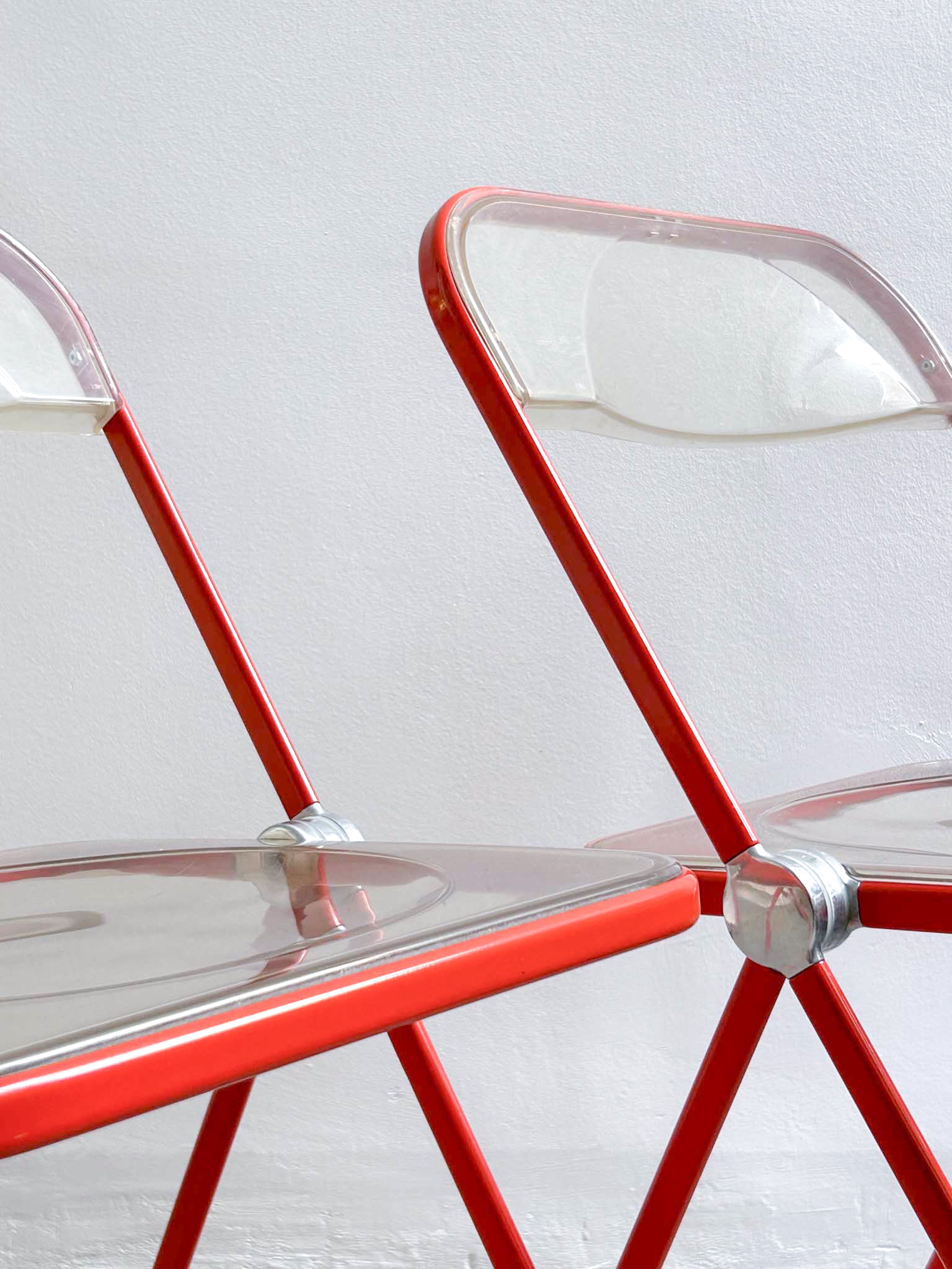 four Plia chairs by Giancarlo Piretti