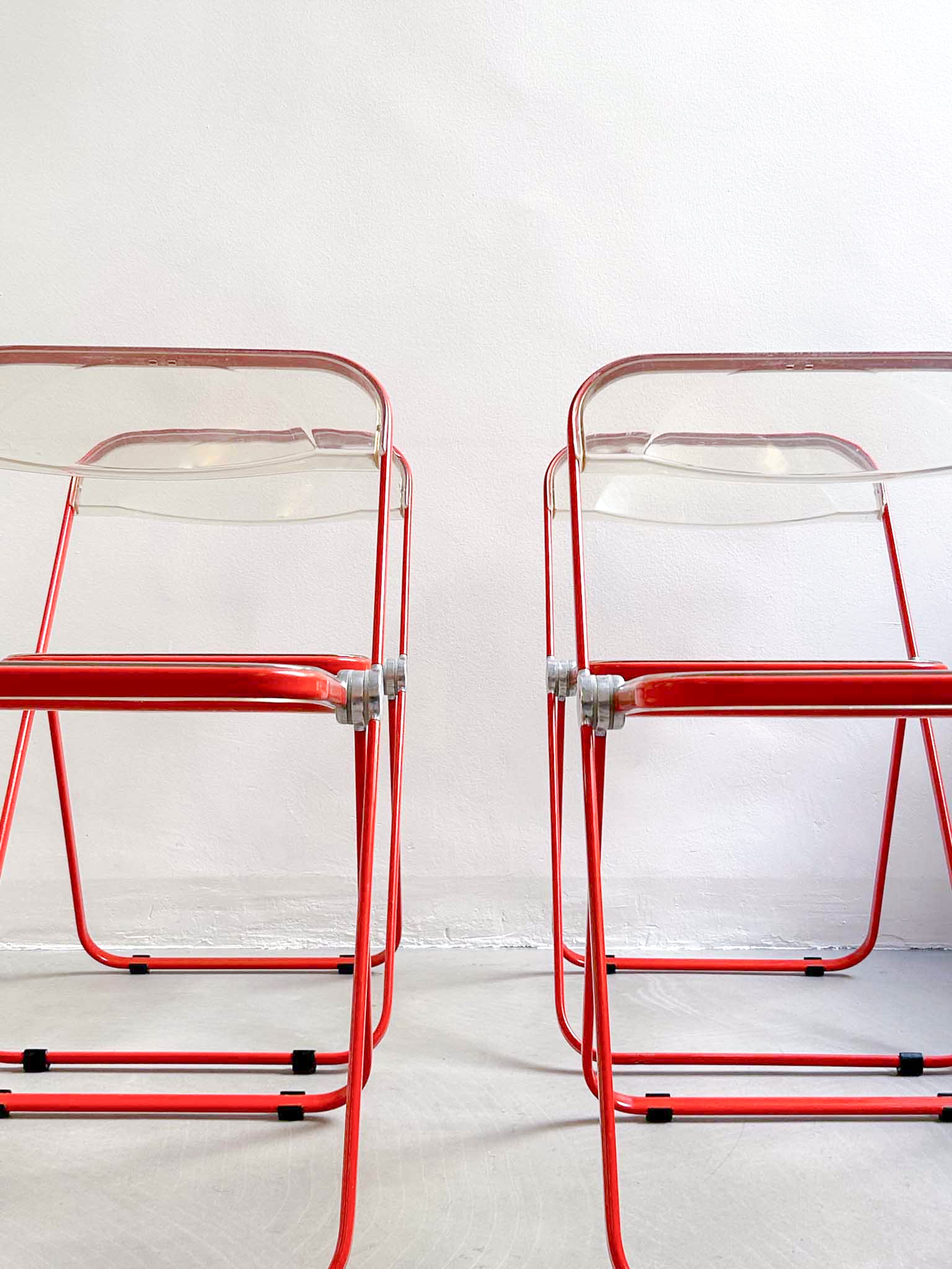 four Plia chairs by Giancarlo Piretti