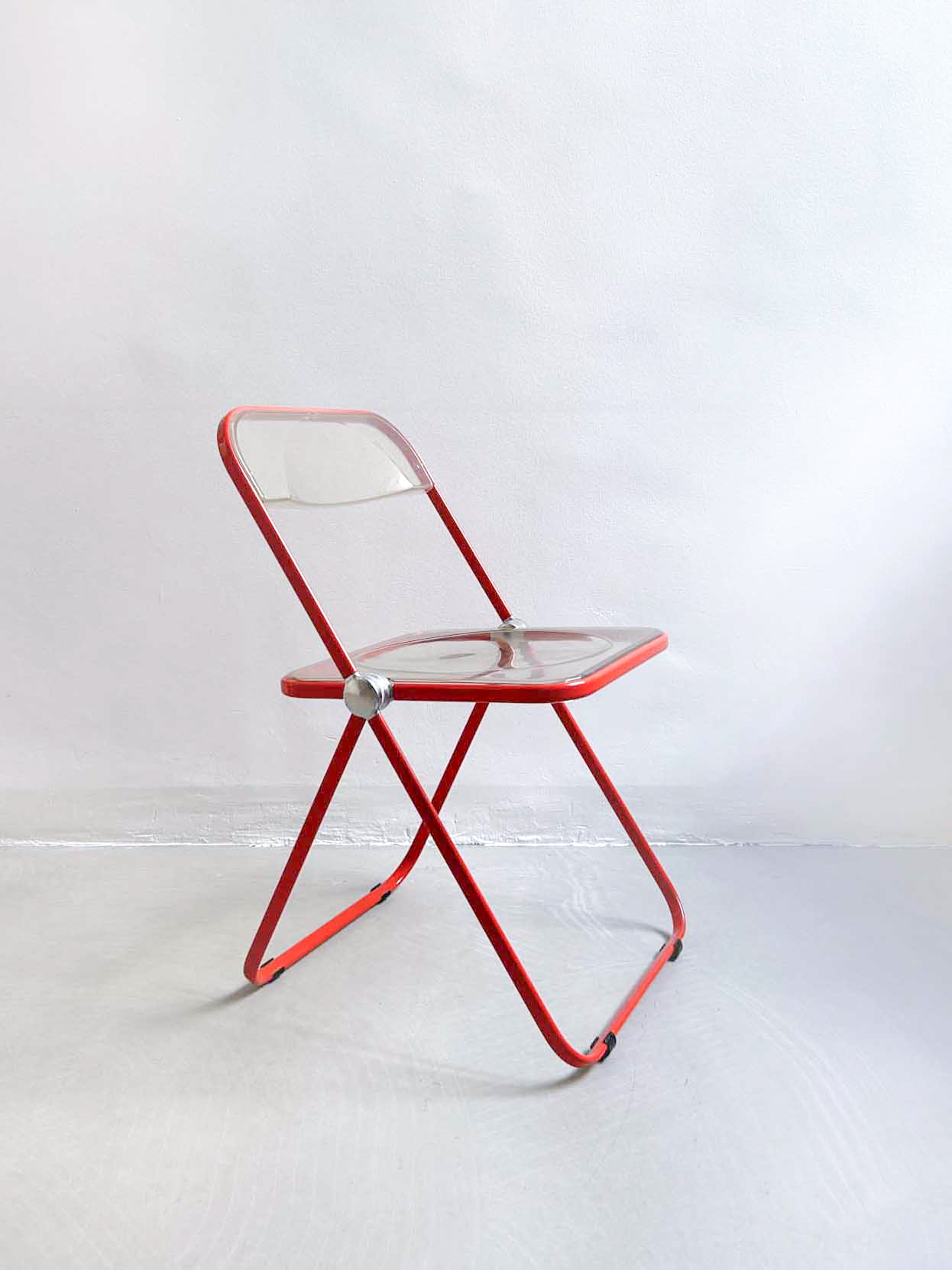 four Plia chairs by Giancarlo Piretti