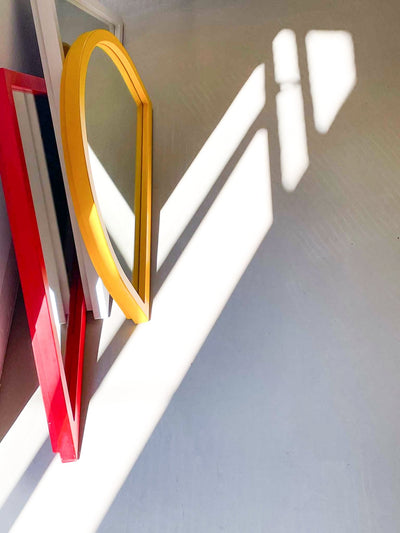 white triangle mirror by Anna Castelli by artetica - Design from Milan